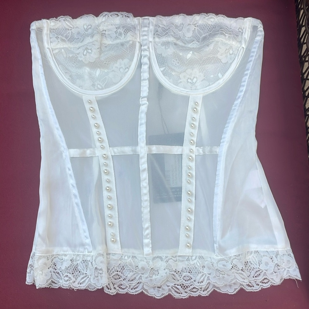 White corset. Brand new with tags! Pretty little things. US size 4